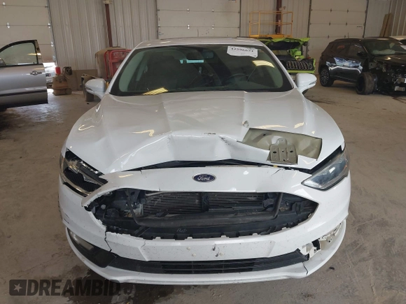 2017 Ford Fusion Titanium with VIN 3FA6P0D9XHR136815, listed as a IAAI auction lot 42596651 with 109,608 mi miles and . Bid and sale history available at DreamBid. Image 12.