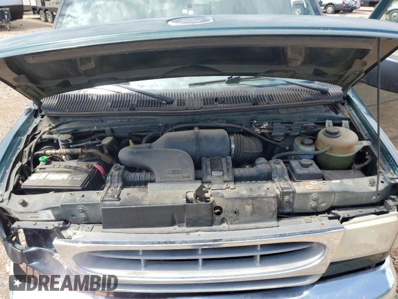 2000 Ford Econoline Passenger XL with VIN 1FBSS31L5YHA98957, listed as a Copart auction lot 56466624 with 102,350 mi miles and Salvage Title. Bid and sale history available at DreamBid. Image 14.