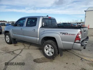 2014 Toyota Tacoma PreRunner with VIN 3TMJU4GN3EM163067, listed as a Copart auction lot 41582155 with 101,971 mi miles and Salvage Title. Bid and sale history available at DreamBid. Image 2.