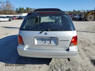 1997 Honda Odyssey with VIN RA11239041, listed as a Copart auction lot 85819024 with 79,952 mi miles and Salvage title. Bid and sale history available at DreamBid. Image 6.