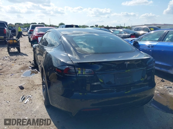 2022 Tesla Model S Plaid with VIN 5YJSA1E63NF478351, listed as a IAAI auction lot 42056199 with Not provided miles and . Bid and sale history available at DreamBid. Image 3.