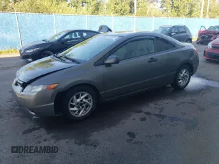 2006 Honda Civic Cpe DX with VIN 2HGFG12276H000805, listed as a Copart auction lot 71200794 with 309,041 mi miles and Salvage Title. Bid and sale history available at carsss.com. Image 1.