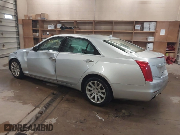 2014 Cadillac CTS Luxury AWD with VIN 1G6AX5S3XE0158960, listed as a IAAI auction lot 41258609 with 84,360 mi miles and . Bid and sale history available at DreamBid. Image 3.