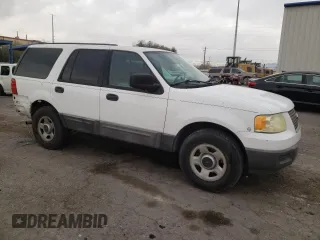 2004 Ford Expedition XLS with VIN 1FMRU13W74LB40774, listed as a Copart auction lot 84467024 with 217,945 mi miles and Salvage Title. Bid and sale history available at carsss.com. Image 4.