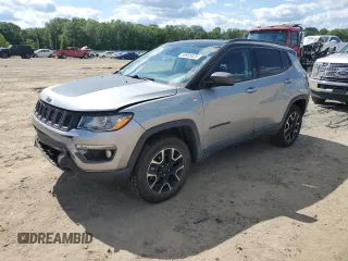 2021 Jeep Compass Trailhawk with VIN 3C4NJDDB5MT571837, listed as a Copart auction lot 58865625 with 75,456 mi miles and Salvage title. Bid and sale history available at DreamBid. Image 1.