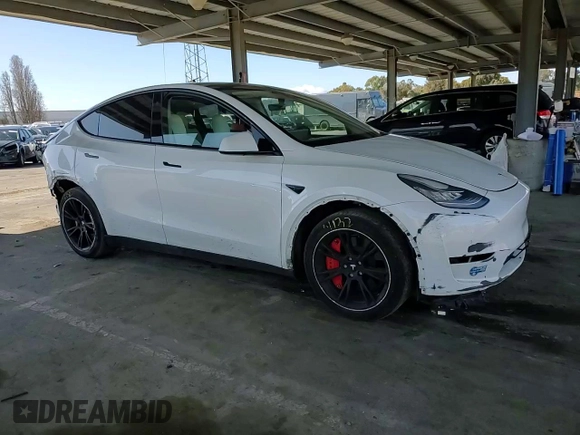 2021 Tesla Model Y Long Range z VIN 5YJYGDEE7MF228787, wystawiony jako Copart lot #47252275 z przebiegiem 59 823 mil mil oraz Szkoda całkowita • Salvage title. Historia ofert i sprzedaży dostępna na DreamBid. Obrazek 11.