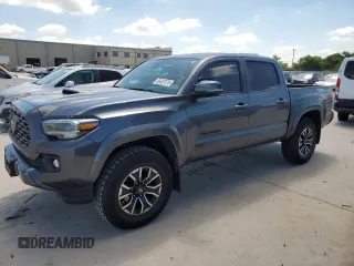2022 Toyota Tacoma SR5 z VIN 3TMAZ5CN4NM184443, wystawiony jako Copart lot #56667575 z przebiegiem 61 801 mil mil oraz Szkoda całkowita • Salvage title. Historia ofert i sprzedaży dostępna na DreamBid. Obrazek 1.