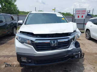 2020 Honda Ridgeline RTL with VIN 5FPYK3F51LB029859, listed as a IAAI auction lot 42462285 with 57,399 mi miles and . Bid and sale history available at DreamBid. Image 13.