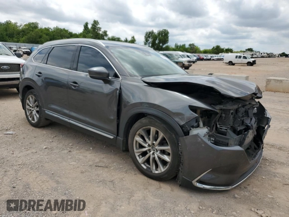 2016 Mazda CX-9 Grand Touring with VIN JM3TCADY3G0125814, listed as a Copart auction lot 58299595 with 127,035 mi miles and Salvage title. Bid and sale history available at DreamBid. Image 4.