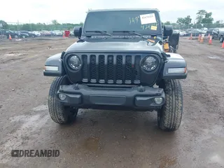 2023 Jeep Gladiator Overland with VIN 1C6JJTFM9PL593659, listed as a IAAI auction lot 42470253 with 34,374 mi miles and . Bid and sale history available at DreamBid. Image 17.