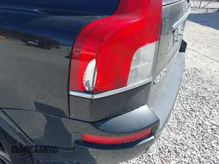 2013 Volvo XC90 Premier Plus z VIN YV4952CZ3D1658584, wystawiony jako IAAI lot #41778313 z przebiegiem 157 597 mil mil oraz . Historia ofert i sprzedaży dostępna na DreamBid. Obrazek 6.