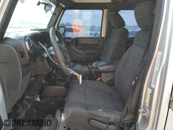 2012 Jeep Wrangler Unlimited Sport z VIN 1C4BJWDG8CL220960, wystawiony jako Copart lot #57823315 z przebiegiem 177 541 mil mil oraz Szkoda całkowita • Salvage title. Historia ofert i sprzedaży dostępna na DreamBid. Obrazek 7.