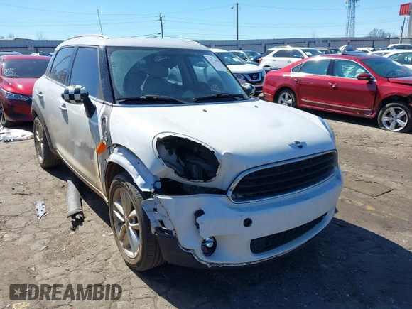 2014 MINI Countryman with VIN WMWZB3C52EWR42241, listed as a IAAI auction lot 41734963 with 121,325 mi miles and . Bid and sale history available at DreamBid. Image 1.