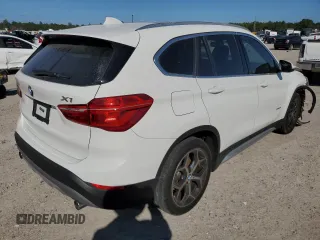 2018 BMW X1 xDrive28i with VIN WBXHT3C39J5K26126, listed as a Copart auction lot 65973652 with 44,059 mi miles. Bid and sale history available at carsss.com. Image 4.
