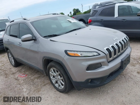 2018 Jeep Cherokee Latitude with VIN 1C4PJLCX4JD559096, listed as a IAAI auction lot 41925282 with 127,488 mi miles and . Bid and sale history available at DreamBid. Image 1.