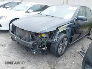 2018 Kia Optima EX with VIN KNAGU4LE6J5020594, listed as a IAAI auction lot 42118299 with 65,482 mi miles and . Bid and sale history available at DreamBid. Image 2.