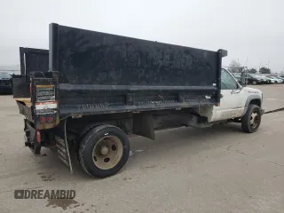 2001 GMC Sierra 1500 with VIN 3GDKC34GX1M100674, listed as a Copart auction lot 43498685 with 140,259 mi miles and Salvage Title. Bid and sale history available at DreamBid. Image 3.