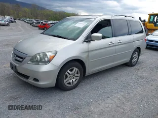 2005 Honda Odyssey EX-L with VIN 5FNRL38795B083325, listed as a IAAI auction lot 42034632 with 183,865 mi miles. Bid and sale history available at carsss.com. Image 2.