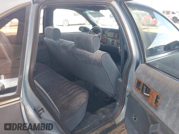 1992 Chevrolet Caprice with VIN 1G1BL53E1NR119546, listed as a IAAI auction lot 41461158 with 140,234 mi miles and . Bid and sale history available at DreamBid. Image 8.