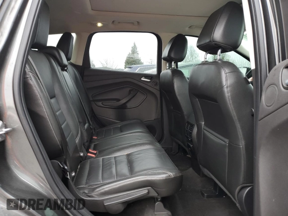 2015 Ford Escape Titanium with VIN 1FMCU9J92FUA62323, listed as a Copart auction lot 85826724 with 108,315 mi miles and Salvage Title. Bid and sale history available at DreamBid. Image 12.