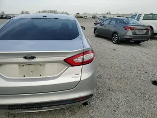 2013 Ford Fusion SE with VIN 3FA6P0HR3DR310633, listed as a Copart auction lot 52946725 with 105,056 mi miles and Salvage title. Bid and sale history available at DreamBid. Image 11.