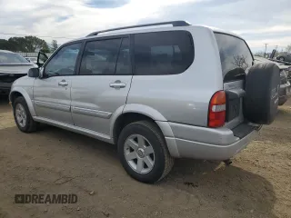 2003 Suzuki XL7 Touring z VIN JS3TX92V934111781, wystawiony jako Copart lot #47422395 z przebiegiem 248 137 mil mil oraz Czysty tytuł • Clean title. Historia ofert i sprzedaży dostępna na DreamBid. Obrazek 2.