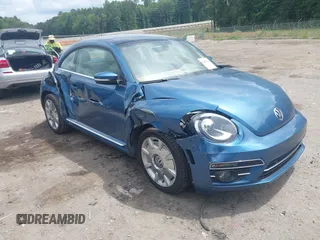 2019 Volkswagen Beetle SE with VIN 3VWJD7AT2KM711920, listed as a IAAI auction lot 42485544 with 69,789 mi miles and . Bid and sale history available at DreamBid. Image 1.