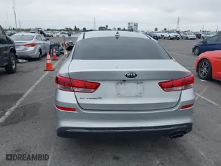 2019 Kia Optima LX with VIN 5XXGT4L3XKG285486, listed as a IAAI auction lot 41872981 with 101,981 mi miles. Bid and sale history available at carsss.com. Image 16.