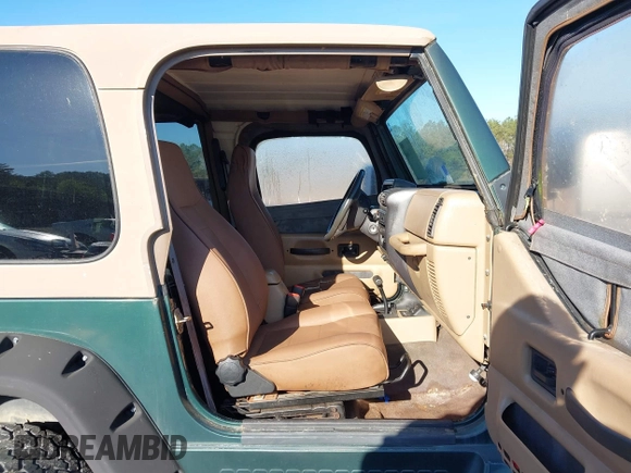 2000 Jeep Wrangler Sahara with VIN 1J4FA59S2YP734290, listed as a IAAI auction lot 41874866 with 201,036 mi miles. Bid and sale history available at carsss.com. Image 5.