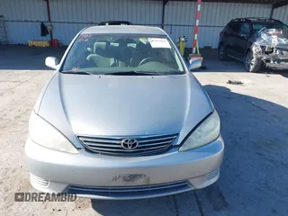 2005 Toyota Camry LE z VIN 4T1BE30K65U543152, wystawiony jako IAAI lot #42183864 z przebiegiem 228 285 mil mil oraz . Historia ofert i sprzedaży dostępna na DreamBid. Obrazek 12.