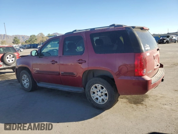 2007 GMC Yukon SLT with VIN 1GKFK13037J101824, listed as a Copart auction lot 77865294 with 179,884 mi miles and Salvage Title. Bid and sale history available at DreamBid. Image 2.