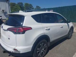 2017 Toyota RAV4 LE with VIN JTMBFREV4HJ112595, listed as a IAAI auction lot 42234289 with 207,379 mi miles and . Bid and sale history available at carsss.com. Image 13.