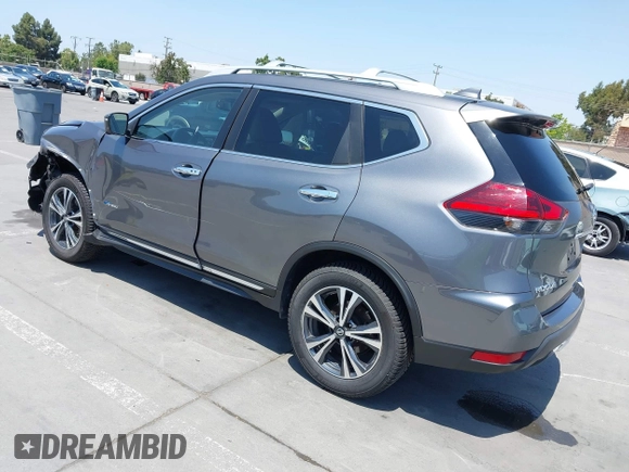 2017 Nissan Rogue SL Hybrid z VIN 5N1ET2MV9HC768242, wystawiony jako IAAI lot #42443514 z przebiegiem 84 879 mil mil oraz . Historia ofert i sprzedaży dostępna na DreamBid. Obrazek 3.