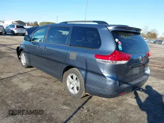 2014 Toyota Sienna LE AAS with VIN 5TDKK3DC4ES514981, listed as a IAAI auction lot 41601188 with 164,963 mi miles and . Bid and sale history available at DreamBid. Image 3.