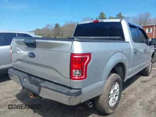 2015 Ford F-150 XLT with VIN 1FTEW1EG5FFA40936, listed as a IAAI auction lot 42011697 with 199,722 mi miles. Bid and sale history available at carsss.com. Image 4.