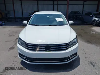 2016 Volkswagen Passat S z VIN 1VWAT7A33GC056162, wystawiony jako IAAI lot #42476725 z przebiegiem 88 872 mil mil oraz . Historia ofert i sprzedaży dostępna na DreamBid. Obrazek 13.
