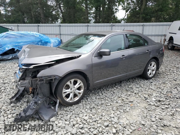 2012 Ford Fusion SE with VIN 3FAHP0HA0CR355529, listed as a Copart auction lot 62585515 with 113,094 mi miles and Salvage title. Bid and sale history available at DreamBid. Image 1.
