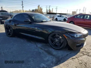 2011 BMW Z4 sDrive35is with VIN WBALM1C58BE393909, listed as a Copart auction lot 89218305 with 112,502 mi miles and Salvage Title. Bid and sale history available at carsss.com. Image 4.