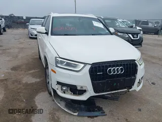 2015 Audi Q3 Premium Plus z VIN WA1EFCFS2FR008193, wystawiony jako IAAI lot #42301074 z przebiegiem 102 878 mil mil oraz . Historia ofert i sprzedaży dostępna na DreamBid. Obrazek 1.