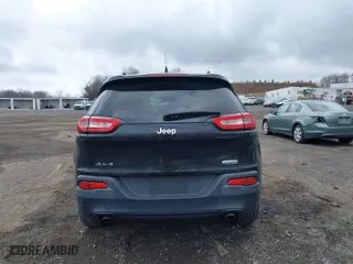 2014 Jeep Cherokee Latitude with VIN 1C4PJMCS0EW264288, listed as a IAAI auction lot 41921730 with 137,586 mi miles. Bid and sale history available at carsss.com. Image 16.