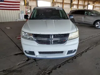 2017 Dodge Journey SE with VIN 3C4PDCAB0HT671574, listed as a Copart auction lot 53886655 with 132,663 mi miles and Clean Title. Bid and sale history available at carsss.com. Image 5.