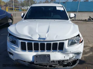 2014 Jeep Grand Cherokee Laredo with VIN 1C4RJEAGXEC130399, listed as a IAAI auction lot 41861664 with 106,925 mi miles. Bid and sale history available at carsss.com. Image 12.