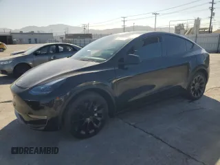 2024 Tesla Model Y Long Range z VIN 7SAYGDEE8RA231933, wystawiony jako Copart lot #58078115 z przebiegiem 14 959 mil mil oraz Szkoda całkowita • Salvage title. Historia ofert i sprzedaży dostępna na DreamBid. Obrazek 1.