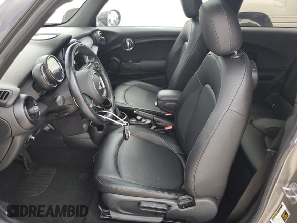 2018 MINI Hardtop Cooper with VIN WMWXP5C56J2H29012, listed as a Copart auction lot 50571595 with 77,129 mi miles and Salvage title. Bid and sale history available at DreamBid. Image 7.