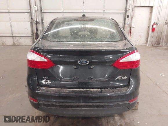 2014 Ford Fiesta SE with VIN 3FADP4BJ9EM212156, listed as a IAAI auction lot 41791690 with 92,760 mi miles and . Bid and sale history available at DreamBid. Image 17.