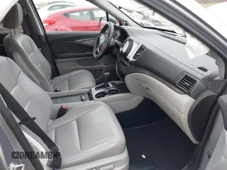 2017 Honda Pilot EX-L with VIN 5FNYF6H5XHB014067, listed as a IAAI auction lot 42083742 with 143,043 mi miles and . Bid and sale history available at DreamBid. Image 5.