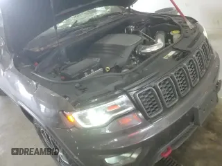 2018 Jeep Grand Cherokee Trailhawk с VIN 1C4RJFLT5JC105095, выставлен на аукционе Copart как лот 62488195 с пробегом 107 593 миль миль и Списание • Salvage title. История ставок и продаж доступна на DreamBid. Изображение 14.