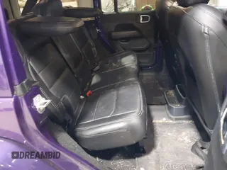 2023 Jeep Wrangler Sahara with VIN 1C4HJXEN9PW560958, listed as a IAAI auction lot 41980179 with 35,975 mi miles and . Bid and sale history available at DreamBid. Image 8.