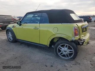 2009 MINI Cooper Convertible with VIN WMWMR33549TU95327, listed as a Copart auction lot 88493115 with 76,714 mi miles and Salvage Title. Bid and sale history available at carsss.com. Image 2.