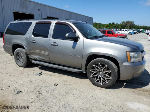 2012 Chevrolet Suburban LT with VIN 1GNSCJE04CR236950, listed as a Copart auction lot 53024265 with 216,314 mi miles and Salvage Title. Bid and sale history available at carsss.com. Image 4.